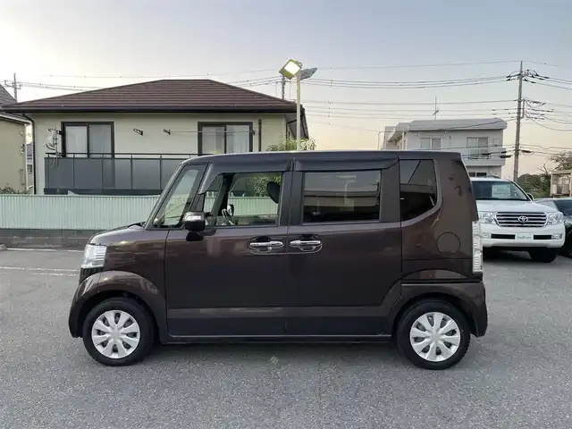 ホンダ Ｎ ＢＯＸ G Lパッケージ 埼玉県 2016(平28)年 7.6万km プレミアムディープモカパール ・OP電動スライドドア/・KENNWOODナビゲーション/・CD/DVD/BT/ワンセグTV/・バックカメラ/・スマートキー/・クラッツィオシートカバー/・ドライブレコーダー/・ビルトインETC/・ウインカードアミラー/・スリップコントロール/・フロアマット/・ドアバイザー/・社外アルミ（サマータイヤ付き）車載あり