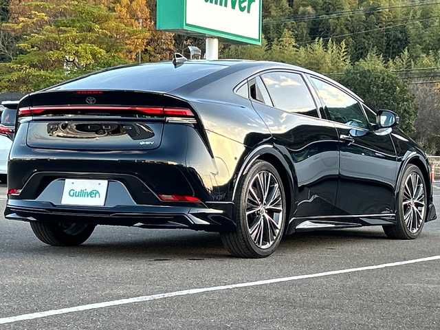 トヨタ プリウス Z 佐賀県 2023(令5)年 1.8万km アティチュードブラックマイカ モデリスタエアロ/純正12.3インチナビ(フルセグ/Bluetooth/Carplay)/全方位カメラ/D/N席シートヒーター・エアーシート/D席パワーシート・メモリーシート/ステアリングヒーター/前後ドライブレコーダー/ビルトイン2.0ETC/置くだけ充電/トヨタセーフティセンス/レーダークルーズコントロール/クリアランスソナー/LEDヘッドライト/オートライト/純正19インチアルミホイール/純正フロアマット
