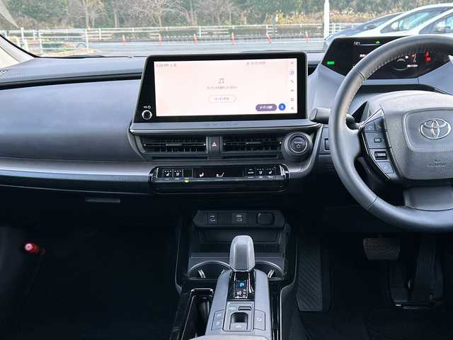 トヨタ プリウス Z 佐賀県 2023(令5)年 1.8万km アティチュードブラックマイカ モデリスタエアロ/純正12.3インチナビ(フルセグ/Bluetooth/Carplay)/全方位カメラ/D/N席シートヒーター・エアーシート/D席パワーシート・メモリーシート/ステアリングヒーター/前後ドライブレコーダー/ビルトイン2.0ETC/置くだけ充電/トヨタセーフティセンス/レーダークルーズコントロール/クリアランスソナー/LEDヘッドライト/オートライト/純正19インチアルミホイール/純正フロアマット