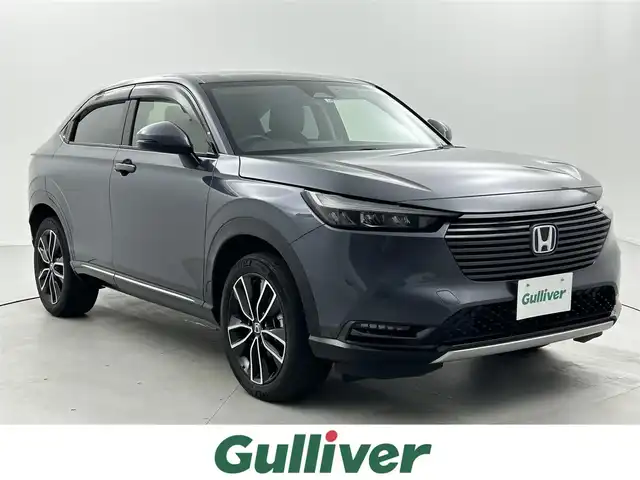 ホンダ ヴェゼル ハイブリッド e:HEV Z 福井県 2021(令3)年 4.1万km メテオロイドグレーメタリック ホンダセンシング/純正8インチメモリナビ/（BT/USB/FM/AM）/フルセグTV/ビルトインＥＴＣ/バックカメラ/純正ドライブレコーダー前後/ステアリングヒーター/シートヒーター（D＋N）/ハーフレザーシート/パワーバックドア/純正アルミホイール/純正ラバーマット/ドアバイザー/LEDライト/プッシュスタート/スマートキー/スペアキー1本