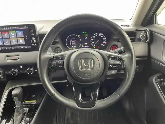 ホンダ ヴェゼル ハイブリッド e:HEV Z 福井県 2021(令3)年 4.1万km メテオロイドグレーメタリック ホンダセンシング/純正8インチメモリナビ/（BT/USB/FM/AM）/フルセグTV/ビルトインＥＴＣ/バックカメラ/純正ドライブレコーダー前後/ステアリングヒーター/シートヒーター（D＋N）/ハーフレザーシート/パワーバックドア/純正アルミホイール/純正ラバーマット/ドアバイザー/LEDライト/プッシュスタート/スマートキー/スペアキー1本