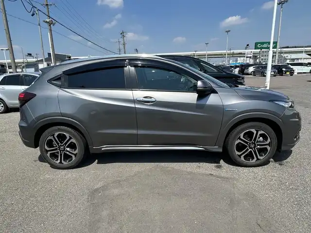 ホンダ ヴェゼル ハイブリッド Z ホンダセンシング 愛知県 2020(令2)年 2.5万km スーパープラチナグレーメタリック Gathers純正ナビ/（フルセグ、Bluetooth、CD/DVD、FM/AM）/レーダークルーズコントロール/ホンダセンシング/衝突軽減ブレーキ/バックカメラ/ETC/シートヒーター/コーナーセンサー/パドルシフト（MTモード）/LEDヘッドライト/ドライブレコーダー/全ドアワンタッチ式パワーウインドウ/プラズマクラスター技術搭載フルオートエアコン(左右独立)/スタッドレスタイヤ付き社外アルミ4本積込