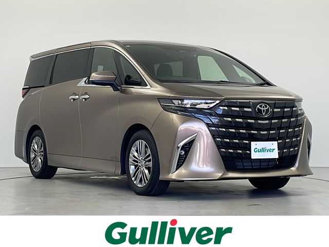 トヨタ アルファード Z 岐阜県 2024(令6)年 0.7万km ゴールド 左右独立ムーンルーフ/ユニバーサルステップ/ワイヤレス充電/純正14インチナビ/（フルセグ/Bluetooth/Apple Car Play）/全周囲カメラ/アダプティブクルーズコントロール/ブラインドスポットモニター/デジタルインナーミラー/パワーシート（前席・二列目）/シートヒーター（前席・二列目）/エアシート（前席・二列目）/オートLEDライト/オートハイビーム/ビルトインETC2.0/前後ドライブレコーダー/ステアリングヒーター/スマートキー/保証書/取扱説明書/スペアキー