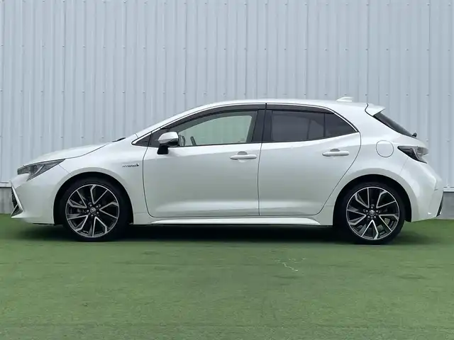 トヨタ カローラ スポーツ ハイブリッドG Z 香川県 2019(平31)年 4.6万km ホワイトパールクリスタルシャイン 登録時走行距離：46044km/純正9インチ「ナビ/フルセグTV/バックカメラ/ドライブレコーダー/ブラインドスポットモニター/レーダークルーズコントロール/レーダー探知機/LEDオートライト/フォグライト/コーナーセンサー/レーンキープアシスト/オートハイビーム/横滑り防止/スマートキー