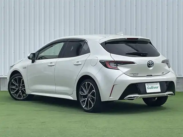 トヨタ カローラ スポーツ ハイブリッドG Z 香川県 2019(平31)年 4.6万km ホワイトパールクリスタルシャイン 登録時走行距離：46044km/純正9インチ「ナビ/フルセグTV/バックカメラ/ドライブレコーダー/ブラインドスポットモニター/レーダークルーズコントロール/レーダー探知機/LEDオートライト/フォグライト/コーナーセンサー/レーンキープアシスト/オートハイビーム/横滑り防止/スマートキー