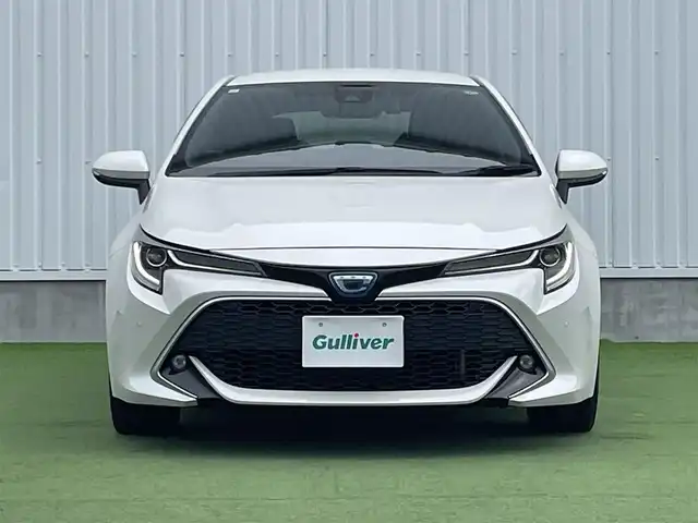 トヨタ カローラ スポーツ ハイブリッドG Z 香川県 2019(平31)年 4.6万km ホワイトパールクリスタルシャイン 登録時走行距離：46044km/純正9インチ「ナビ/フルセグTV/バックカメラ/ドライブレコーダー/ブラインドスポットモニター/レーダークルーズコントロール/レーダー探知機/LEDオートライト/フォグライト/コーナーセンサー/レーンキープアシスト/オートハイビーム/横滑り防止/スマートキー