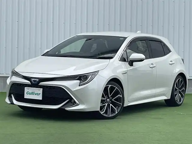 トヨタ カローラ スポーツ ハイブリッドG Z 香川県 2019(平31)年 4.6万km ホワイトパールクリスタルシャイン 登録時走行距離：46044km/純正9インチ「ナビ/フルセグTV/バックカメラ/ドライブレコーダー/ブラインドスポットモニター/レーダークルーズコントロール/レーダー探知機/LEDオートライト/フォグライト/コーナーセンサー/レーンキープアシスト/オートハイビーム/横滑り防止/スマートキー