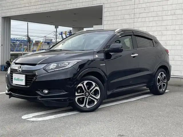 ホンダ ヴェゼル ハイブリッド Z 福岡県 2014(平26)年 6.7万km クリスタルブラックパール 純正７型メモリーナビ（CD）バックモニタークルコンドラレコETCシートヒーター純正LED/マット/アルミスマートキープッシュスタートエンジンスターター