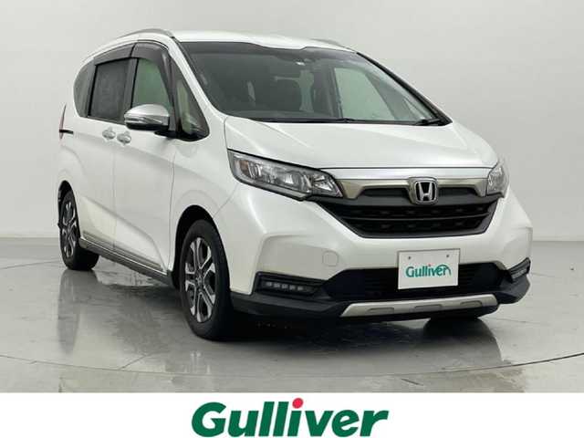 ホンダ フリード クロスター ホンダセンシング 熊本県 2020(令2)年 3万km プラチナホワイトパール 純正ナビ【VXM-204VFi】/・(CD/DVD/フルセグ/BT/SD/USB)/バックカメラ/社外前後ドライブレコーダー/ビルトインETC/両側パワースライドドア/ホンダセンシング/・アダプティブクルーズコントロール/・衝突軽減ブレーキ/・誤発進制御機能/・後方誤発進抑制機能/・近距離衝突軽減ブレーキ/・歩行者事故低減ステアリング/・路外逸脱制御機能/・車線維持支援システム/横滑り防止/アイドリングストップ/純正15インチアルミホイール/革巻きステアリング/ステアリングスイッチ/ハーフレザーシート/ルーフレール/オートライト/LEDヘッドライト/フォグライト/スマートキー/プッシュスタート/スペアキー1本/保証書/取扱説明書