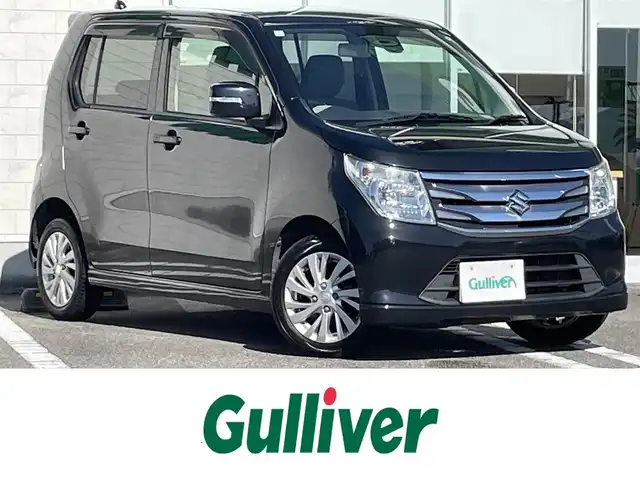 スズキ ワゴンＲ FZ 宮崎県 2015(平27)年 11.3万km ブルーイッシュブラックパール3 アイドリングストップ/プッシュスタート/純正フロアマット/純正LEDヘッドライト/オートライト/エアバックW/パワーステアリング/パワーウィンドウ/スマートキー/盗難防止装置/衝突被害軽減システム/横滑り防止装置/AAC/ABS/シートヒーター/純正アルミホイール（14インチ）