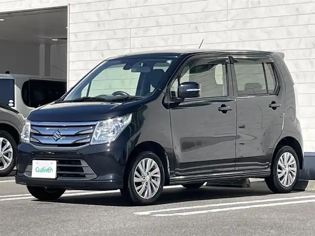 スズキ ワゴンＲ FZ 宮崎県 2015(平27)年 11.3万km ブルーイッシュブラックパール3 アイドリングストップ/プッシュスタート/純正フロアマット/純正LEDヘッドライト/オートライト/エアバックW/パワーステアリング/パワーウィンドウ/スマートキー/盗難防止装置/衝突被害軽減システム/横滑り防止装置/AAC/ABS/シートヒーター/純正アルミホイール（14インチ）