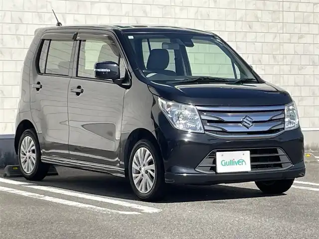 スズキ ワゴンＲ FZ 宮崎県 2015(平27)年 11.3万km ブルーイッシュブラックパール3 アイドリングストップ/プッシュスタート/純正フロアマット/純正LEDヘッドライト/オートライト/エアバックW/パワーステアリング/パワーウィンドウ/スマートキー/盗難防止装置/衝突被害軽減システム/横滑り防止装置/AAC/ABS/シートヒーター/純正アルミホイール（14インチ）