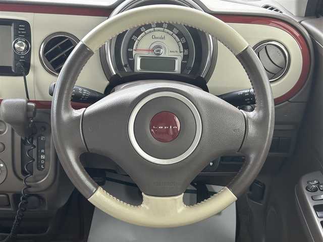 スズキ ラパン ショコラ G 埼玉県 2015(平27)年 7.6万km アーバンブラウンパールメタリック 純正スマートフォン連携ナビ　ＨＩＤヘッドライト　ＥＴＣ　Ｂカメラ　合皮シート　ワンセグ　禁煙車　アイドリングストップ　スマートキー　取扱説明書　横滑り防止　オートライト　盗難防止　ＡＢＳ　ベンチシート