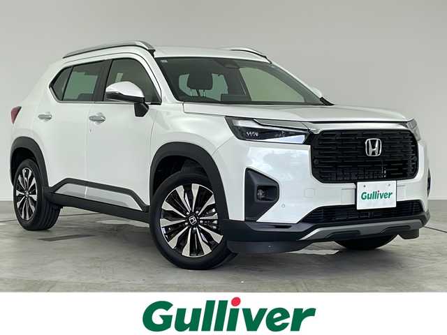 ホンダ ＷＲ－Ｖ Z+ 愛知県 2024(令6)年 0.6万km プラチナホワイトパール /禁煙車//純正HondaCONNECTナビ//フルセグTV//バックカメラ//ETC//Z+専用エクステリア//ホンダセンシング//衝突軽減ブレーキ//先行車発進お知らせ//歩行者事故低減ステアリング//路外逸脱抑制機能//標識認識機能//アダプティブクルーズコントロール//レーンキープアシストシステム//誤発進抑制機能(前後方)//急アクセル抑制機能//前後パーキングセンサー//オートハイビーム//フルLEDヘッドライト//オートライト//フロントフォグランプ//ルーフレール//プライムスムース&ファブリックコンビシート//トノカバー//純正17インチアルミホイール(切削+ベルリナブラック塗装)//革巻きステアリング//ステアリングスイッチ//パドルシフト//純正フロアマット//プッシュスタート//電動格納ミラーウィンカー//横滑り防止装置