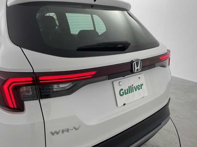 ホンダ ＷＲ－Ｖ Z+ 愛知県 2024(令6)年 0.6万km プラチナホワイトパール /禁煙車//純正HondaCONNECTナビ//フルセグTV//バックカメラ//ETC//Z+専用エクステリア//ホンダセンシング//衝突軽減ブレーキ//先行車発進お知らせ//歩行者事故低減ステアリング//路外逸脱抑制機能//標識認識機能//アダプティブクルーズコントロール//レーンキープアシストシステム//誤発進抑制機能(前後方)//急アクセル抑制機能//前後パーキングセンサー//オートハイビーム//フルLEDヘッドライト//オートライト//フロントフォグランプ//ルーフレール//プライムスムース&ファブリックコンビシート//トノカバー//純正17インチアルミホイール(切削+ベルリナブラック塗装)//革巻きステアリング//ステアリングスイッチ//パドルシフト//純正フロアマット//プッシュスタート//電動格納ミラーウィンカー//横滑り防止装置