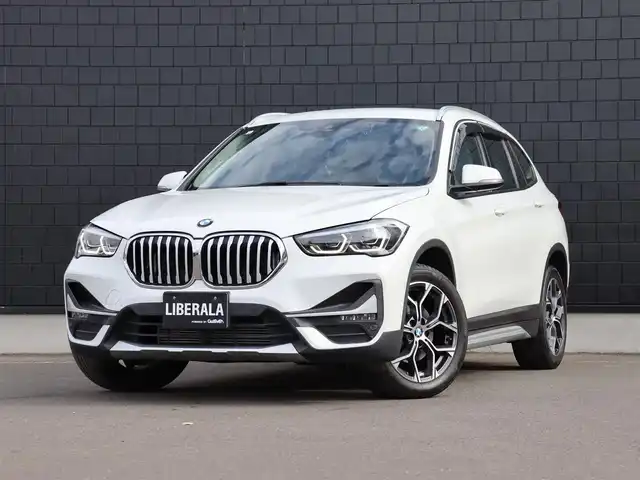 ＢＭＷ Ｘ１ xDrive 18d xライン 宮城県 2020(令2)年 3万km アルピンホワイトⅢ 純正ナビ（ＢＴ）/ＬＩＭスイッチ/インテリジェントセーフティ/ダイナミックトラクションコントロール/パークディスタンス/ダウンヒルアシスト/バックカメラ/ドライブモード/ハーフレザーシート/パワーシート（DN席）/メモリーシート（D席）/コーナーセンサー（前後）/デュアルエアコン/電動格納ミラー/ドライブレコーダー（前方）/リヤフォグランプ/フロントフォグランプ/プッシュスタート/コンフォートアクセス/MTモード付/ミラー一体型ETC/純正１８インチAW/純正フロアマット/ＬＥＤヘッドライト/オートライト/アイドリングストップ/禁煙車