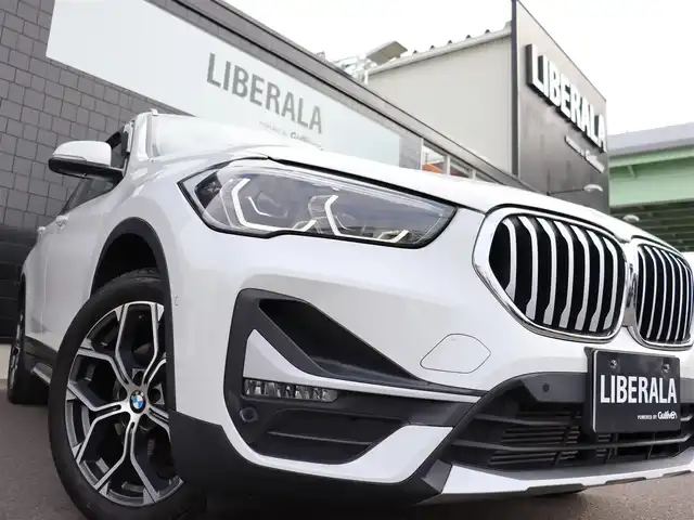 ＢＭＷ Ｘ１ xDrive 18d xライン 宮城県 2020(令2)年 3万km アルピンホワイトⅢ 純正ナビ（ＢＴ）/ＬＩＭスイッチ/インテリジェントセーフティ/ダイナミックトラクションコントロール/パークディスタンス/ダウンヒルアシスト/バックカメラ/ドライブモード/ハーフレザーシート/パワーシート（DN席）/メモリーシート（D席）/コーナーセンサー（前後）/デュアルエアコン/電動格納ミラー/ドライブレコーダー（前方）/リヤフォグランプ/フロントフォグランプ/プッシュスタート/コンフォートアクセス/MTモード付/ミラー一体型ETC/純正１８インチAW/純正フロアマット/ＬＥＤヘッドライト/オートライト/アイドリングストップ/禁煙車