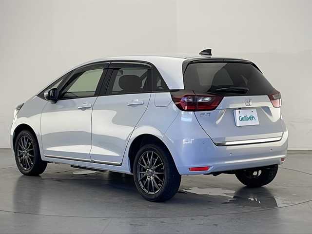 ホンダ フィット リュクス 長野県 2020(令2)年 3.4万km プレミアムサンライトホワイトパール 4WD/寒冷地仕様/純正ナビ/（Bluetooth/CD/USB/AM/FM)/バックカメラ/純正AWサマータイヤ4本/衝突軽減ブレーキ/レーンキープアシスト/レーダークルーズコントロール/前後コーナーセンサー/踏み間違い防止/前席シートヒーター/ステアリングヒーター/ETC/電子パーキングブレーキ/LEDヘッドライト/スマートキー/スペアキー