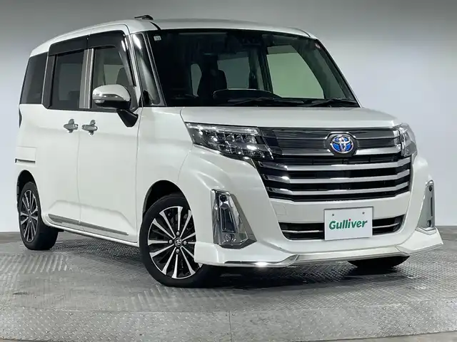 トヨタ ルーミー カスタムG－T 神奈川県 2020(令2)年 3万km パールホワイトⅢ ・純正９型SDナビゲーション【NSZT-Y68T】/＜フルセグ/CD/DVD/AMFM/BT＞/・バックカメラ/・両側パワースライドドア /・純正前方ドラレコ/・ビルトインETC/・電動パーキング/オートホールド/・前席シートヒーター/・社外GPSレーダー/・アイドリングストップ/・運転席シートリフター/・スマートキー/・プッシュスタート/・二列目シートバックテーブル/・オートライト/オートハイビーム/・革巻きステアリング/・前後ソナー/・スマートアシスト/・純正１５インチアルミホイール/・LEDヘッドライト/LEDフォグ