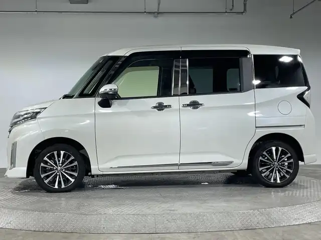 トヨタ ルーミー カスタムG－T 神奈川県 2020(令2)年 3万km パールホワイトⅢ ・純正９型SDナビゲーション【NSZT-Y68T】/＜フルセグ/CD/DVD/AMFM/BT＞/・バックカメラ/・両側パワースライドドア /・純正前方ドラレコ/・ビルトインETC/・電動パーキング/オートホールド/・前席シートヒーター/・社外GPSレーダー/・アイドリングストップ/・運転席シートリフター/・スマートキー/・プッシュスタート/・二列目シートバックテーブル/・オートライト/オートハイビーム/・革巻きステアリング/・前後ソナー/・スマートアシスト/・純正１５インチアルミホイール/・LEDヘッドライト/LEDフォグ