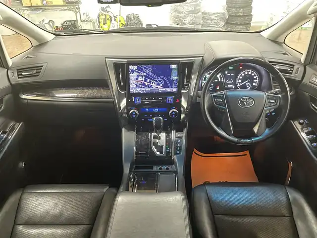 トヨタ アルファードハイブリット SR 道央・札幌 2019(平31)年 8.9万km ラグジュアリーホワイトパールクリスタルシャインガラスフレーク ワンオーナー/4WD/寒冷地仕様/OP　TRDエアロ（フロント/サイド/リア）/OP　TRD4本出しマフラー/ALPINE　11型ナビ/フルセグ/Bluetooth/CD/DVD/SD/HDMI/ALPINE　12.8型フリップダウンモニター/衝突軽減ブレーキ/レーンキープアシスト/横滑り防止/両側パワースライドドア/パワーバックドア/レーダークルーズコントロール/三眼LEDヘッドライト/シーケンシャルウィンカー/黒革シート/パワーシート（D/N）/エアーシート（D/N）/シートヒーター（D/N）/スマートキー×2/純正エンジンスターター/フロントワイパーデアイサー/コムテック前後ドラレコ/オートマチックハイビーム/保証書/取扱説明書