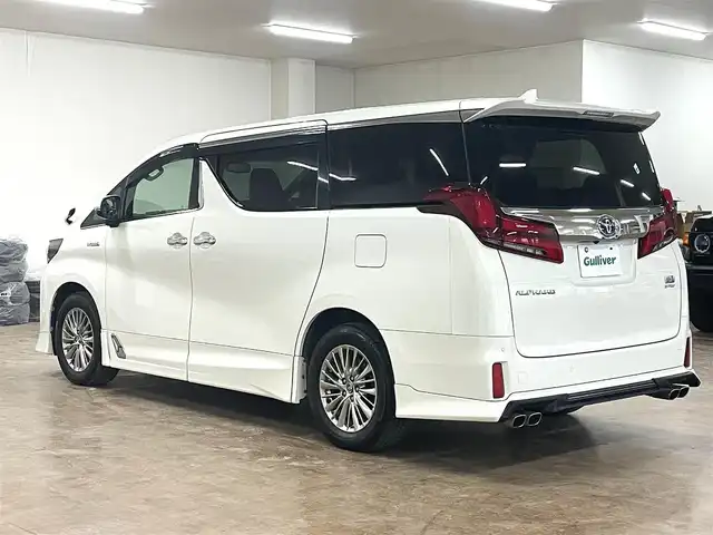 トヨタ アルファードハイブリット SR 道央・札幌 2019(平31)年 8.9万km ラグジュアリーホワイトパールクリスタルシャインガラスフレーク ワンオーナー/4WD/寒冷地仕様/OP　TRDエアロ（フロント/サイド/リア）/OP　TRD4本出しマフラー/ALPINE　11型ナビ/フルセグ/Bluetooth/CD/DVD/SD/HDMI/ALPINE　12.8型フリップダウンモニター/衝突軽減ブレーキ/レーンキープアシスト/横滑り防止/両側パワースライドドア/パワーバックドア/レーダークルーズコントロール/三眼LEDヘッドライト/シーケンシャルウィンカー/黒革シート/パワーシート（D/N）/エアーシート（D/N）/シートヒーター（D/N）/スマートキー×2/純正エンジンスターター/フロントワイパーデアイサー/コムテック前後ドラレコ/オートマチックハイビーム/保証書/取扱説明書