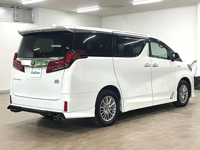 トヨタ アルファードハイブリット SR 道央・札幌 2019(平31)年 8.9万km ラグジュアリーホワイトパールクリスタルシャインガラスフレーク ワンオーナー/4WD/寒冷地仕様/OP　TRDエアロ（フロント/サイド/リア）/OP　TRD4本出しマフラー/ALPINE　11型ナビ/フルセグ/Bluetooth/CD/DVD/SD/HDMI/ALPINE　12.8型フリップダウンモニター/衝突軽減ブレーキ/レーンキープアシスト/横滑り防止/両側パワースライドドア/パワーバックドア/レーダークルーズコントロール/三眼LEDヘッドライト/シーケンシャルウィンカー/黒革シート/パワーシート（D/N）/エアーシート（D/N）/シートヒーター（D/N）/スマートキー×2/純正エンジンスターター/フロントワイパーデアイサー/コムテック前後ドラレコ/オートマチックハイビーム/保証書/取扱説明書