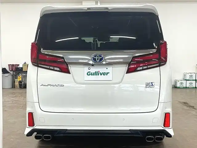 トヨタ アルファードハイブリット SR 道央・札幌 2019(平31)年 8.9万km ラグジュアリーホワイトパールクリスタルシャインガラスフレーク ワンオーナー/4WD/寒冷地仕様/OP　TRDエアロ（フロント/サイド/リア）/OP　TRD4本出しマフラー/ALPINE　11型ナビ/フルセグ/Bluetooth/CD/DVD/SD/HDMI/ALPINE　12.8型フリップダウンモニター/衝突軽減ブレーキ/レーンキープアシスト/横滑り防止/両側パワースライドドア/パワーバックドア/レーダークルーズコントロール/三眼LEDヘッドライト/シーケンシャルウィンカー/黒革シート/パワーシート（D/N）/エアーシート（D/N）/シートヒーター（D/N）/スマートキー×2/純正エンジンスターター/フロントワイパーデアイサー/コムテック前後ドラレコ/オートマチックハイビーム/保証書/取扱説明書