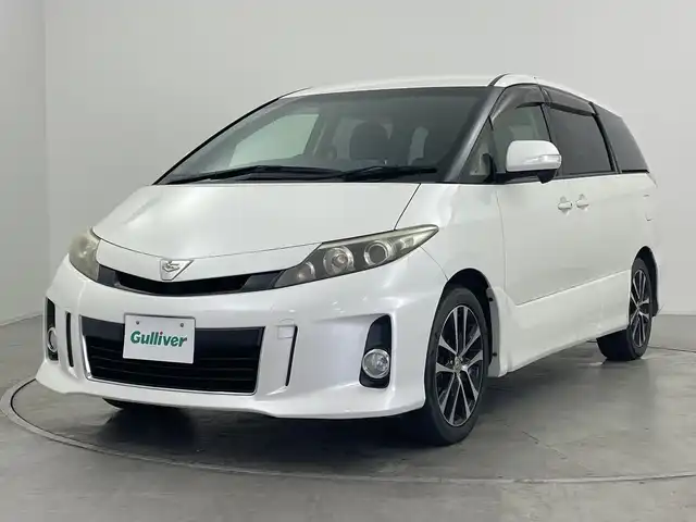 トヨタ エスティマ アエラス 群馬県 2013(平25)年 7.7万km ホワイトパールクリスタルシャイン 純正ナビ 12.1型後席モニター　クルーズコントロール　バックカメラ　ステアリングリモコン　HIDヘッドライト　両側電動スライド　純正ビルトインETC スマートキー　オットマン　レザーステリング　禁煙