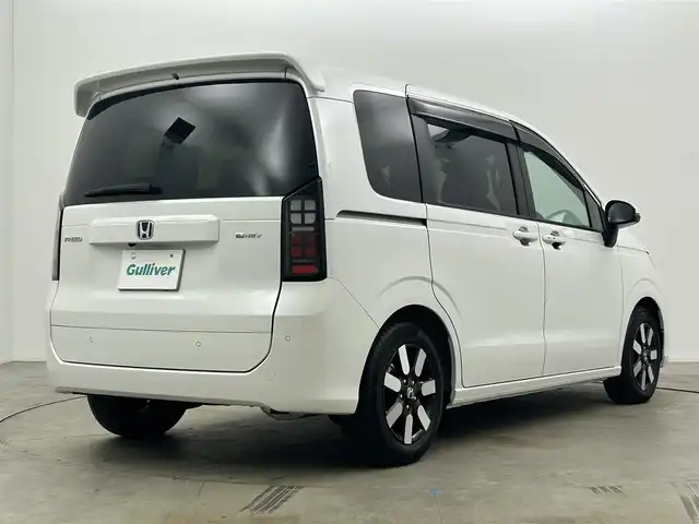 ホンダ フリード ハイブリット e:HEV AIR EX 岡山県 2025(令7)年 0.7万km プラチナホワイトパール 純正11.4インチナビ（LXM-247VFLi）/・FM/AM/Bluetooth/フルセグ/CD/DVD/全方位カメラ/ハーフレザーシート/・シートヒーター/両側パワースライドドア/ETC2.0/ドライブレコーダー/ホンダセンシング/・衝突軽減ブレーキ/・車線逸脱警報/・アダプティブクルーズコントロール/・オートハイビーム/BSM/オートブレーキホールド/純正フロアマット/純正アルミ/新車保証書/取扱説明書/スペアキー×１