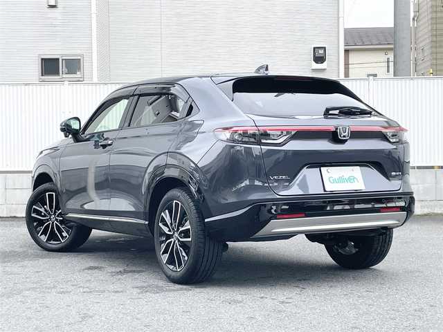ホンダ ヴェゼル ハイブリッド e:HEV Z 栃木県 2023(令5)年 3.8万km メテオロイドグレーメタリック Honda SENSING/・衝突軽減ブレーキ(CMBS)/・誤発進抑制機能/・後方誤発進抑制機能/・近距離衝突軽減ブレーキ/・歩行者事故低減ステアリング/・路外逸脱抑制機能/・渋滞追従機能付アダプティブクルーズコントロー(ACC)/・車線維持支援システム(LKAS)/・トラフィックジャムアシスト(渋滞運転支援機能)/・先行車発進お知らせ機能/・標識認識機能/・オートハイビーム/・パーキングセンサーシステム/アダプティブドライビングビーム/ハンズフリーアクセスパワーテールゲート/純正9インチSDナビ［VXU-235VZi］/・フルセグ/・Bluetooth/・DVD/CD/SD/・USB/リアワイドカメラ/ETC/コンビシート/運転席＆助手席シートヒーター/パドルシフト/フルLEDヘッドライト/18インチアルミホイール