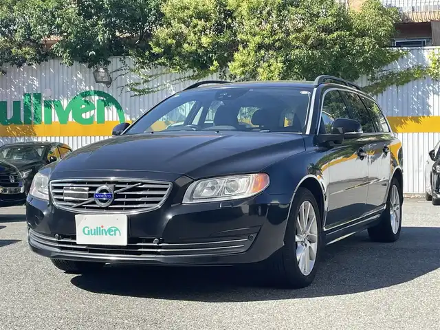 ボルボ Ｖ７０ T4 SE 兵庫県 2014(平26)年 7.8万km 黒 純正ＳＤナビ/・ワンセグＴＶ/・ＡＵＸ/・ＵＳＢ/・オートライト/・純正アルミ/・純正フロアマット/・パドルシフト/・シートヒーター/・エアーシート/・レザーシート/・パワーシート/・スマートキー×２/・取説/・保証書/・パドルシフト/・ルーフレール