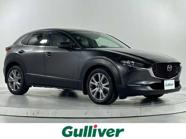 マツダ ＣＸ－３０ XD Lパッケージ 佐賀県 2020(令2)年 4.1万km マシーングレープレミアムM 純正8型ナビ/（ＡＭ/ＦＭ/CD/DVD/Bluetooth/フルセグTV）/全周囲カメラ/クルーズコントロール(追従あり)/パワーバックドア/衝突被害軽減システム/ETC/レーンアシスト/シートヒーター/レザーシート/パワーシート/シートメモリ/オートエアコン/盗難防止装置/横滑り防止装置/オートライト/オートマチックハイビーム/スマートキー/プッシュスタート/パドルシフト/コーナーセンサー/LEDヘッドライト/純正フロアマット/純正18インチアルミホイール/ステアリングスイッチ/ドアバイザー