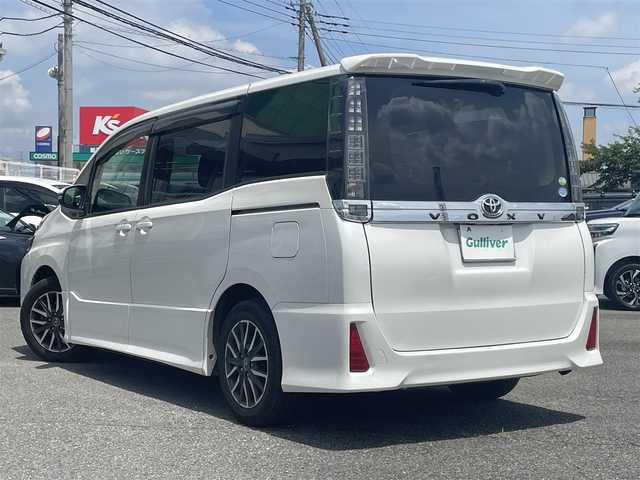 トヨタ ヴォクシー ZS 群馬県 2014(平26)年 14.4万km ホワイトパールクリスタルシャイン 純正SDナビ、地デジ、Bluetooth、CD、DVD/　（NSZT-Y62G）/バックカメラ/TVキャンセラー/革巻きステア/社外フリップダウンモニター/両側パワースライドドア/スマートキー×２/LEDヘッドライト/ビルトインETC/ドアバイザー/整備手帳、取説