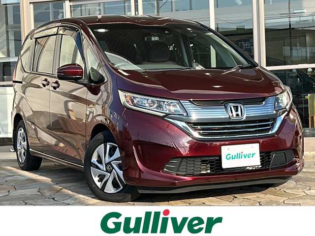 ホンダ フリード ハイブリット G ホンダセンシング 静岡県 2016(平28)年 6.8万km プレミアムディープロッソパール 社外SDナビ/・CD/・DVD/・フルセグＴＶ/・Bluetooth/・AM/・FM/主要装備/・両側パワスラ/・ホンダセンシング/・衝突軽減/・レーンキープ/・追従クルコン/・バックカメラ/・ドラレコ/・ビルトインＥＴＣ/・寒冷地仕様/・ステリモ/・スマートキー/・プッシュスタート/・純正フロアマット/・LEDヘッドライト/・オートライト/・スペアキー1本