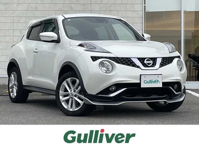 日産 ジューク 15RX Vセレクション 宮崎県 2016(平28)年 10.7万km ブリリアントホワイトパール 純正SDナビ/（CD/AM/FM/BT/AUX)/フルセグTV/バックカメラ/横滑り防止機能/アイドリングストップ/レーンキープアシスト/衝突防止機能/社外エアロ/ETC