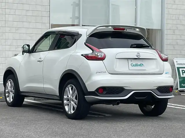 日産 ジューク 15RX Vセレクション 宮崎県 2016(平28)年 10.7万km ブリリアントホワイトパール 純正SDナビ/（CD/AM/FM/BT/AUX)/フルセグTV/バックカメラ/横滑り防止機能/アイドリングストップ/レーンキープアシスト/衝突防止機能/社外エアロ/ETC