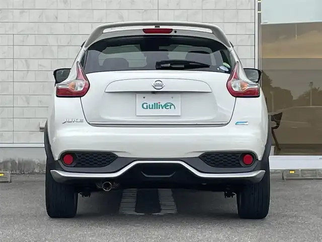日産 ジューク 15RX Vセレクション 宮崎県 2016(平28)年 10.7万km ブリリアントホワイトパール 純正SDナビ/（CD/AM/FM/BT/AUX)/フルセグTV/バックカメラ/横滑り防止機能/アイドリングストップ/レーンキープアシスト/衝突防止機能/社外エアロ/ETC