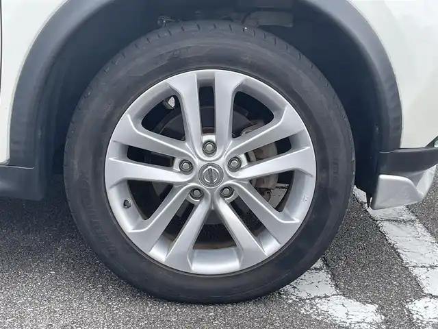 日産 ジューク 15RX Vセレクション 宮崎県 2016(平28)年 10.7万km ブリリアントホワイトパール 純正SDナビ/（CD/AM/FM/BT/AUX)/フルセグTV/バックカメラ/横滑り防止機能/アイドリングストップ/レーンキープアシスト/衝突防止機能/社外エアロ/ETC