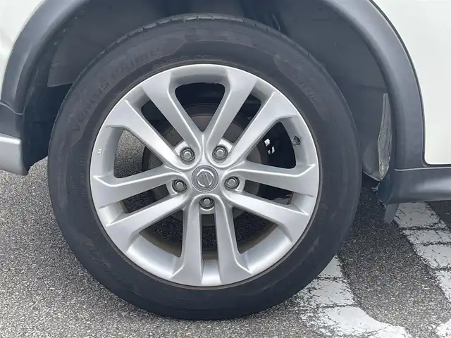 日産 ジューク 15RX Vセレクション 宮崎県 2016(平28)年 10.7万km ブリリアントホワイトパール 純正SDナビ/（CD/AM/FM/BT/AUX)/フルセグTV/バックカメラ/横滑り防止機能/アイドリングストップ/レーンキープアシスト/衝突防止機能/社外エアロ/ETC