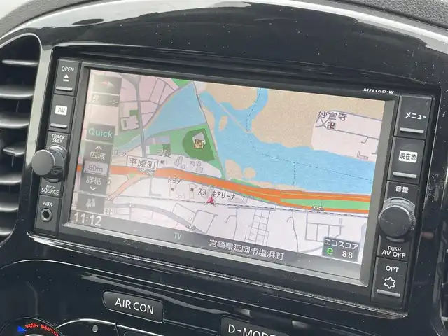 日産 ジューク 15RX Vセレクション 宮崎県 2016(平28)年 10.7万km ブリリアントホワイトパール 純正SDナビ/（CD/AM/FM/BT/AUX)/フルセグTV/バックカメラ/横滑り防止機能/アイドリングストップ/レーンキープアシスト/衝突防止機能/社外エアロ/ETC