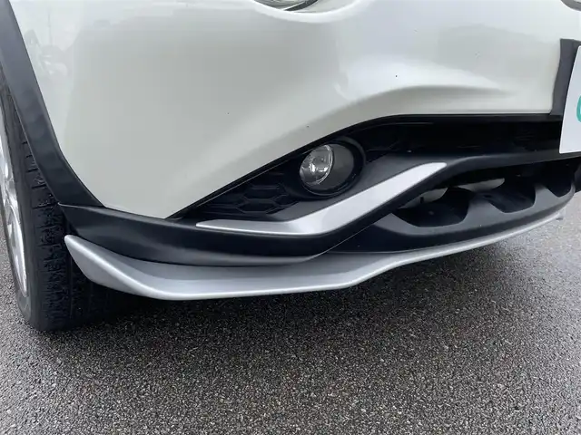 日産 ジューク 15RX Vセレクション 宮崎県 2016(平28)年 10.7万km ブリリアントホワイトパール 純正SDナビ/（CD/AM/FM/BT/AUX)/フルセグTV/バックカメラ/横滑り防止機能/アイドリングストップ/レーンキープアシスト/衝突防止機能/社外エアロ/ETC