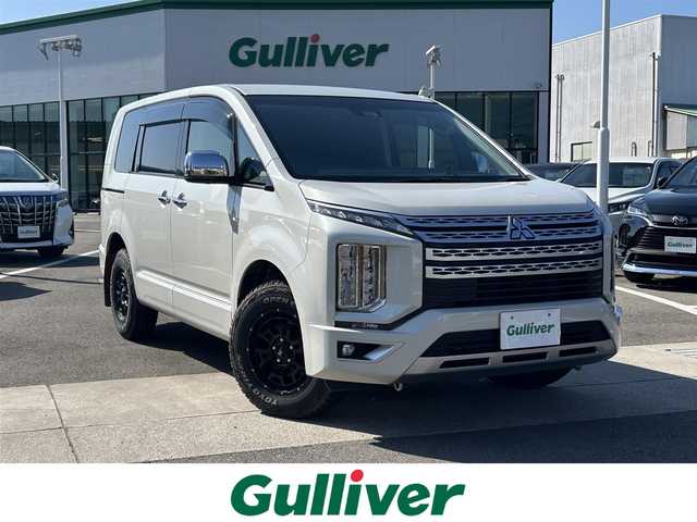 三菱 デリカＤ：５ P 愛媛県 2021(令3)年 3.9万km ポーラホワイト 禁煙車/ALPINE製11インチナビ/CD/DVD/フルセグTV/Bluetooth/HDMI/全方位カメラ/バックカメラ/ブラインドスポットモニター/ルームミラー式レーダー探知機(ASSURA/AR-5)/前後ドライブレコーダー(SDカードなし)/ETC/車内天井ルーフキャリア/衝突被害軽減システム/横滑り防止装置/レーンキープアシスト/レーダークルーズコントロール/LEDヘッドライト/フォグランプ/オートライト/オートマチックハイビーム/前席シートヒーター/運転席パワーシート/ステアリングヒーター/パドルシフト/オートステップ(左)/両側パワースライドドア/パワーバックドア/エンジンスタートボタン/スマートキー/純正フロアマット/NITRO POWER製16インチアルミホイール