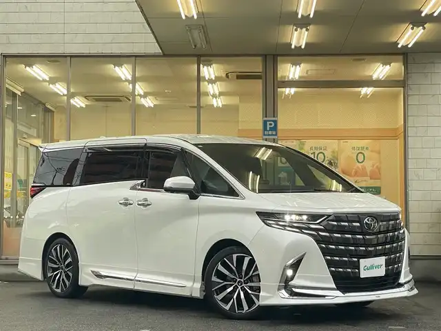 トヨタ アルファードハイブリット Z 愛知県 2024(令6)年 1.1万km プラチナホワイトパールマイカ /当店買取/法人1オナ/モデリスタ20AW/純正アルミ積込//モデリスタエアロブルーイルミネーション付//モデリスタマフラー//モデリスタマルチカラーインテリアイルミ//パノラミックビューモニター//デジタルインナーミラー/ユニバーサルステップ//純正メーカーナビ/純正12.3型有機EL後席モニター//トヨタチームメイト/TSS/ETC2.0/Pソナー/Pアシスト//パワーゲート//フルセグTV/Carplay/Bluetooth/HDMI/typeC//サンルーフ/本革シート/Pシート/シートヒーター//シートベンチレーション/ステアリングヒーター//エアロドアバイザー//LEDヘッド/Aライト/AHB//ISOFIX/純正フロアマット/AC100V//社外セキュリティVIPER/社外インテリアパネル//保証書/取説/後席リモコン