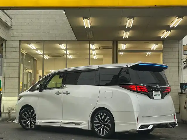 トヨタ アルファードハイブリット Z 愛知県 2024(令6)年 1.1万km プラチナホワイトパールマイカ /当店買取/法人1オナ/モデリスタ20AW/純正アルミ積込//モデリスタエアロブルーイルミネーション付//モデリスタマフラー//モデリスタマルチカラーインテリアイルミ//パノラミックビューモニター//デジタルインナーミラー/ユニバーサルステップ//純正メーカーナビ/純正12.3型有機EL後席モニター//トヨタチームメイト/TSS/ETC2.0/Pソナー/Pアシスト//パワーゲート//フルセグTV/Carplay/Bluetooth/HDMI/typeC//サンルーフ/本革シート/Pシート/シートヒーター//シートベンチレーション/ステアリングヒーター//エアロドアバイザー//LEDヘッド/Aライト/AHB//ISOFIX/純正フロアマット/AC100V//社外セキュリティVIPER/社外インテリアパネル//保証書/取説/後席リモコン