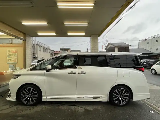 トヨタ アルファードハイブリット Z 愛知県 2024(令6)年 1.1万km プラチナホワイトパールマイカ /当店買取/法人1オナ/モデリスタ20AW/純正アルミ積込//モデリスタエアロブルーイルミネーション付//モデリスタマフラー//モデリスタマルチカラーインテリアイルミ//パノラミックビューモニター//デジタルインナーミラー/ユニバーサルステップ//純正メーカーナビ/純正12.3型有機EL後席モニター//トヨタチームメイト/TSS/ETC2.0/Pソナー/Pアシスト//パワーゲート//フルセグTV/Carplay/Bluetooth/HDMI/typeC//サンルーフ/本革シート/Pシート/シートヒーター//シートベンチレーション/ステアリングヒーター//エアロドアバイザー//LEDヘッド/Aライト/AHB//ISOFIX/純正フロアマット/AC100V//社外セキュリティVIPER/社外インテリアパネル//保証書/取説/後席リモコン