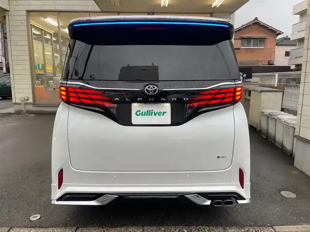 トヨタ アルファードハイブリット Z 愛知県 2024(令6)年 1.1万km プラチナホワイトパールマイカ /当店買取/法人1オナ/モデリスタ20AW/純正アルミ積込//モデリスタエアロブルーイルミネーション付//モデリスタマフラー//モデリスタマルチカラーインテリアイルミ//パノラミックビューモニター//デジタルインナーミラー/ユニバーサルステップ//純正メーカーナビ/純正12.3型有機EL後席モニター//トヨタチームメイト/TSS/ETC2.0/Pソナー/Pアシスト//パワーゲート//フルセグTV/Carplay/Bluetooth/HDMI/typeC//サンルーフ/本革シート/Pシート/シートヒーター//シートベンチレーション/ステアリングヒーター//エアロドアバイザー//LEDヘッド/Aライト/AHB//ISOFIX/純正フロアマット/AC100V//社外セキュリティVIPER/社外インテリアパネル//保証書/取説/後席リモコン