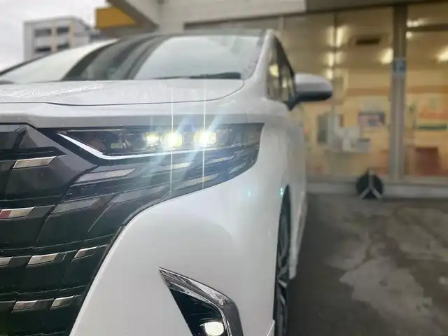 トヨタ アルファードハイブリット Z 愛知県 2024(令6)年 1.1万km プラチナホワイトパールマイカ /当店買取/法人1オナ/モデリスタ20AW/純正アルミ積込//モデリスタエアロブルーイルミネーション付//モデリスタマフラー//モデリスタマルチカラーインテリアイルミ//パノラミックビューモニター//デジタルインナーミラー/ユニバーサルステップ//純正メーカーナビ/純正12.3型有機EL後席モニター//トヨタチームメイト/TSS/ETC2.0/Pソナー/Pアシスト//パワーゲート//フルセグTV/Carplay/Bluetooth/HDMI/typeC//サンルーフ/本革シート/Pシート/シートヒーター//シートベンチレーション/ステアリングヒーター//エアロドアバイザー//LEDヘッド/Aライト/AHB//ISOFIX/純正フロアマット/AC100V//社外セキュリティVIPER/社外インテリアパネル//保証書/取説/後席リモコン