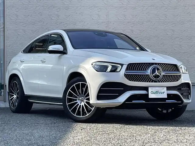 メルセデス・ベンツ Ｍ・ベンツ ＧＬＥ４００ｄ 4MATIC クーペ スポーツ 大阪府 2021(令3)年 1.5万km ダイヤモンドホワイト パノラミックスライディングルーフ/純正HDDナビ/BT/USB/フルセグTV/AppleCarPlay/AndroidAuto/360°カメラ/前後ドラレコ(Y-401di)/レーダー探知機(Z2100)/パーキングアシスト/パドルシフト/アンビエントライト64色/パヒュームアドマイザー/黒革シート/D/N席メモリー付パワーシート/全席シートヒーター/D/N席エアシート/ブルメスターサウンドシステム/D/N席温冷機能付きカップホルダー/ヘッドアップディスプレイ/追従機能付きクルーズコントロール/レーンキープアシスト/ブラインドスポットモニター/ダウンヒルアシストコントロール/前後コーナーセンサー/LEDヘッドライト/オートハイビーム/純正フロアマット/純正21インチAW/純正AW付スタッドレスタイヤ/フットトランクオープナー/スペアキー/ETC2.0