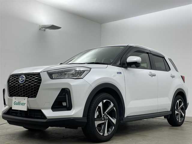 ダイハツ ロッキー プレミアム G HEV 岡山県 2023(令5)年 1.7万km シャイニングホワイトパール 純正9インチナビ/レーダークルーズコントロール/ビルトインＥＴＣ２．０/コーナーセンサー/レーンキープアシスト/シートヒーター/バックカメラ/ＬＥＤヘッドライト/ステアリングスイッチ/踏み間違い防止/オートハイビーム/オートライト/スペアキー